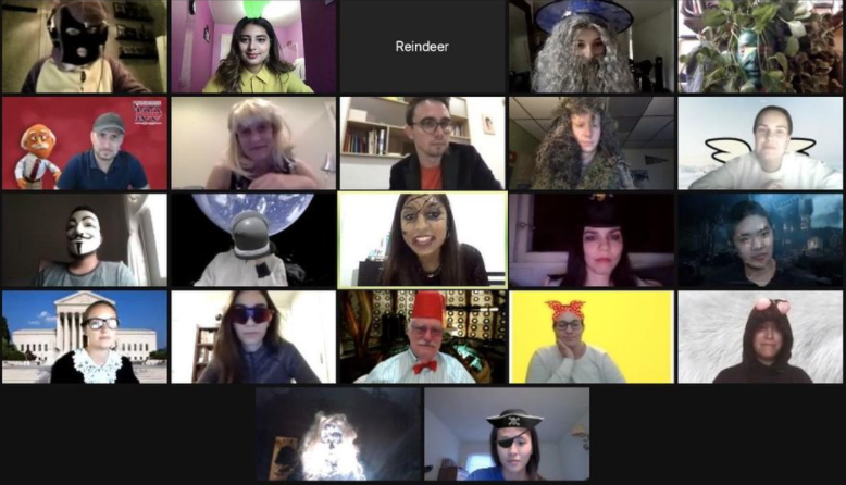 A screen shot about a zoom meeting with the participants dressed up for Halloween.