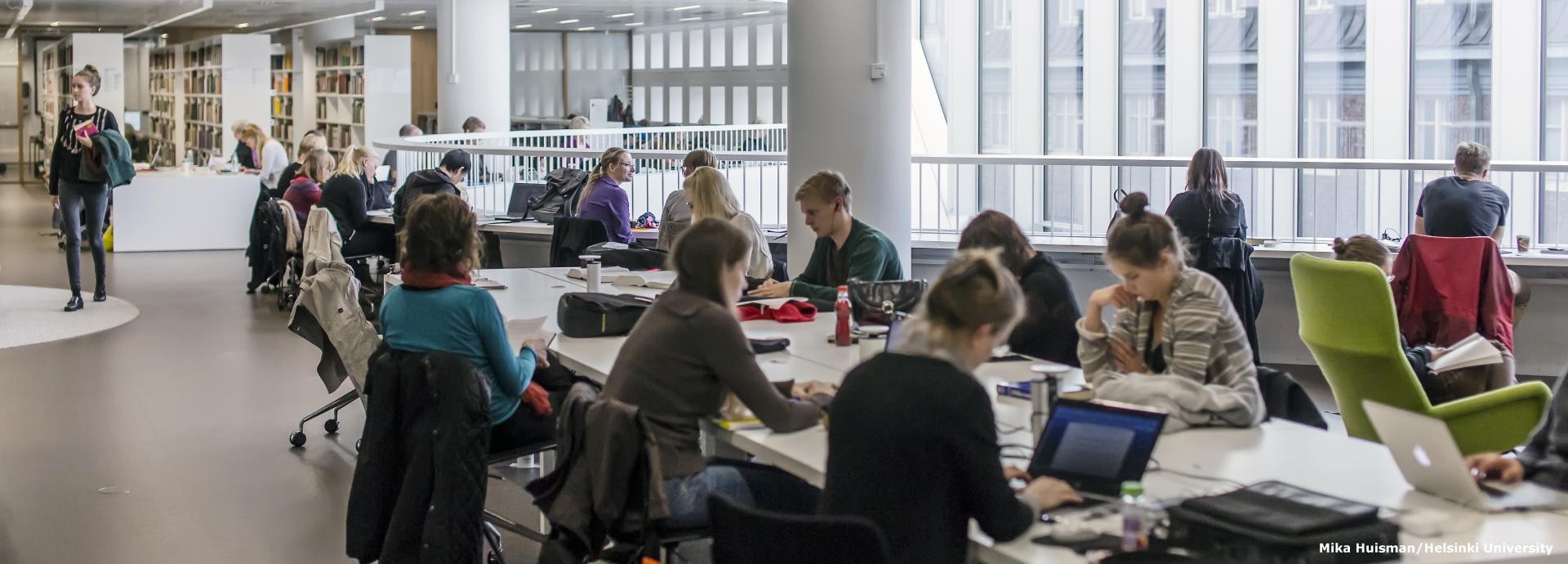Students studying in the Helsinki University Main Library 
