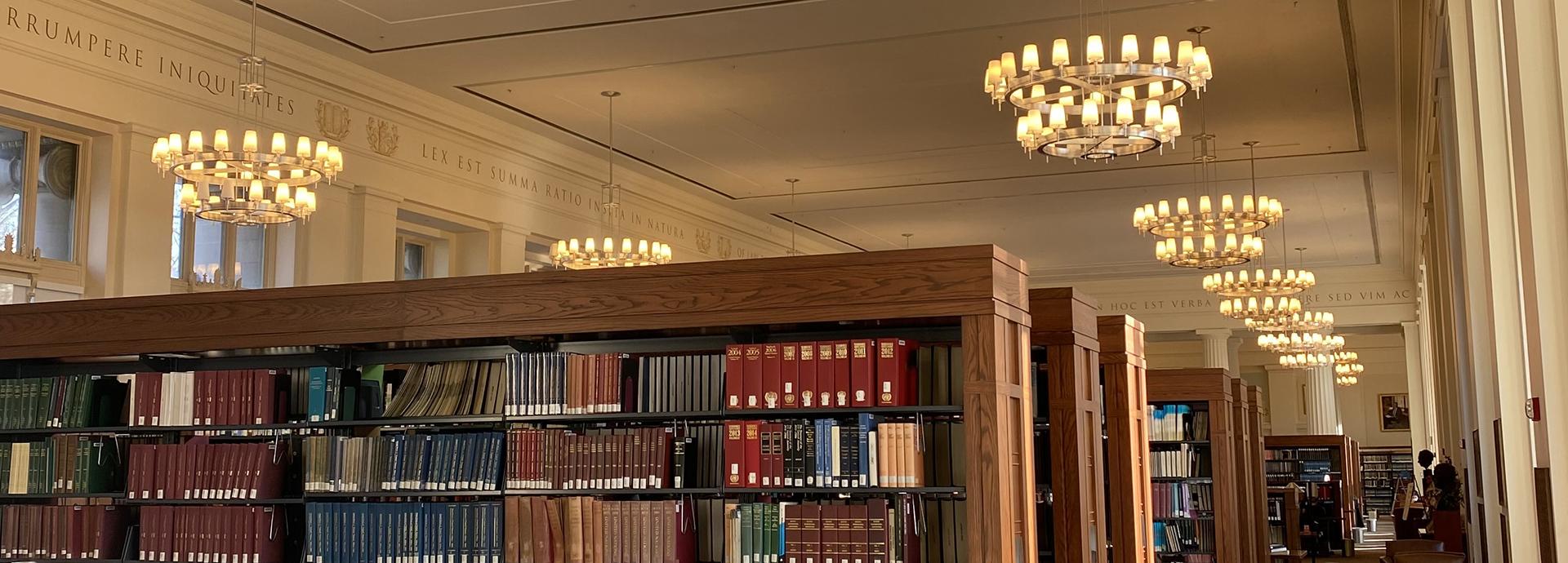 Book shelves and decorative lamps in a library at Harvard University