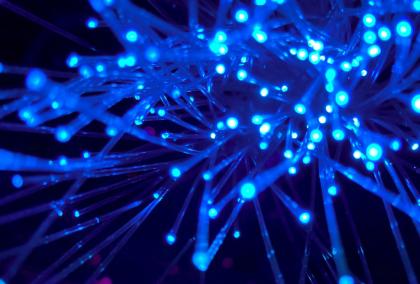 A close-up of neon blue lights