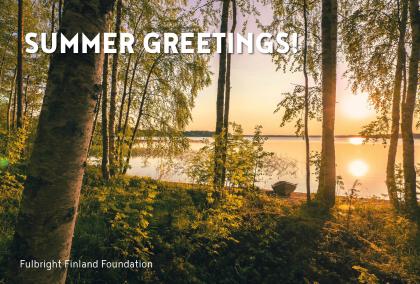 A view to a lake during a sunset in summer with words "Summer Greetings!" and "Fulbright Finland Foundation" written on the photo
