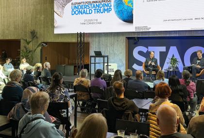 Josh Wilson being interviewed during his public talk at Think Corner Stage