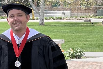 Bruce Blair in his doctoral graduation gown
