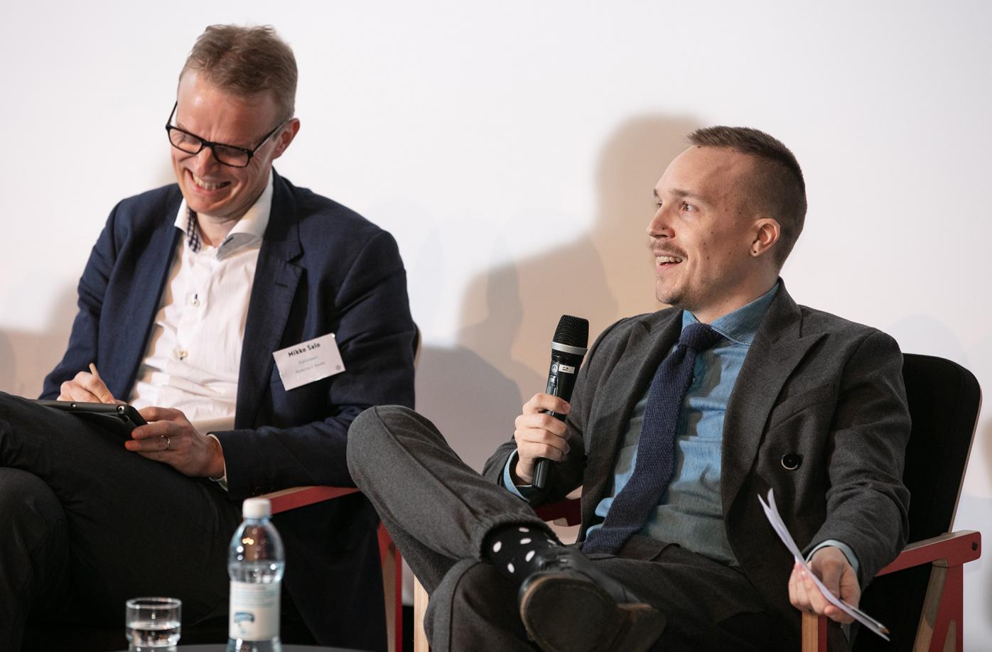 Mikko Salo, co-founder of Faktabaari and award-winning journalist Olli Seuri in a panel discussion.