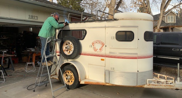 Sarah Flynn renovating an old horse trailer into a mobile sauna
