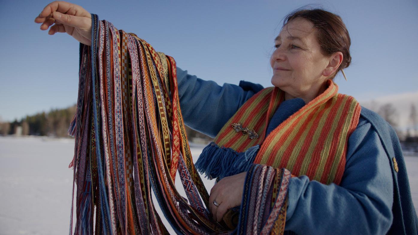 Still from Madison’s documentary featuring Mervi Pasanen, Master Weaver and Expert in Finnish Iron Age Textiles.