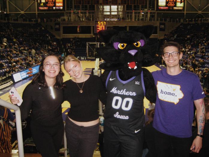 Fiona Ahonen and her friends with University of Northern Iowa's mascot