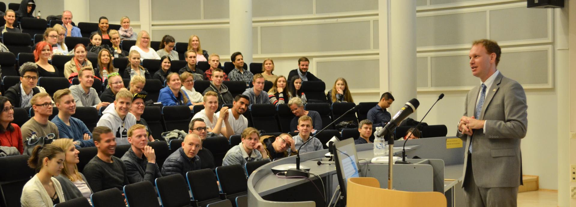 Fulbright-University of Tampere Scholar Peter Miller talking to a full lecture hall at the Metropolia University of Applied Sciences
