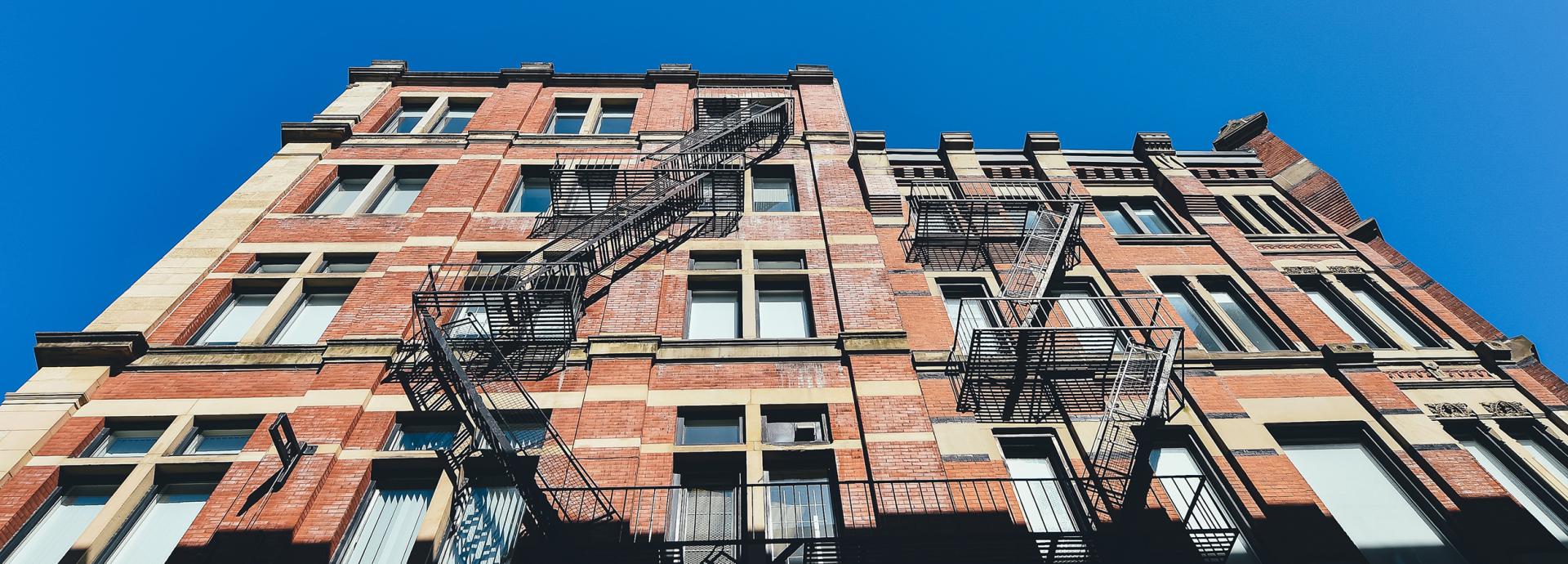 Brick building photographed from below