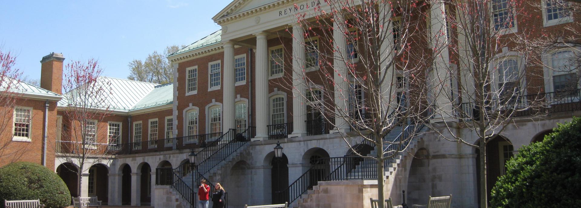 Photo of the Wake Forest University campus with two people walking