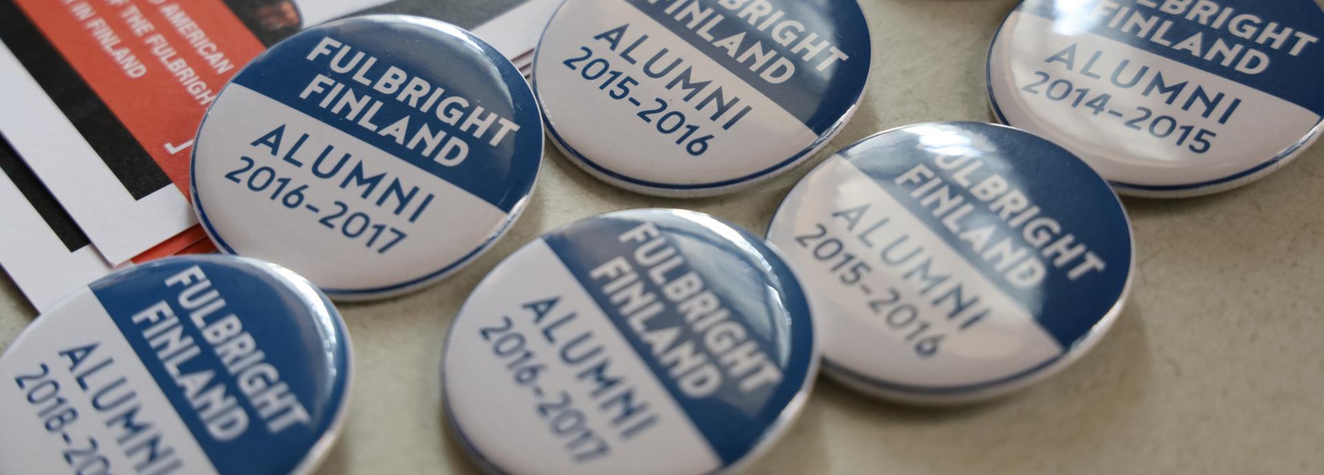 Picture on pins in an alumni event
