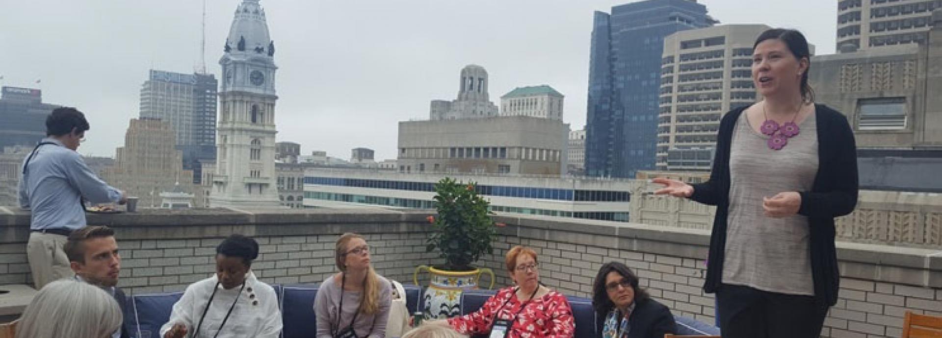 Annie Brandt giving a talk during Finland Brunch