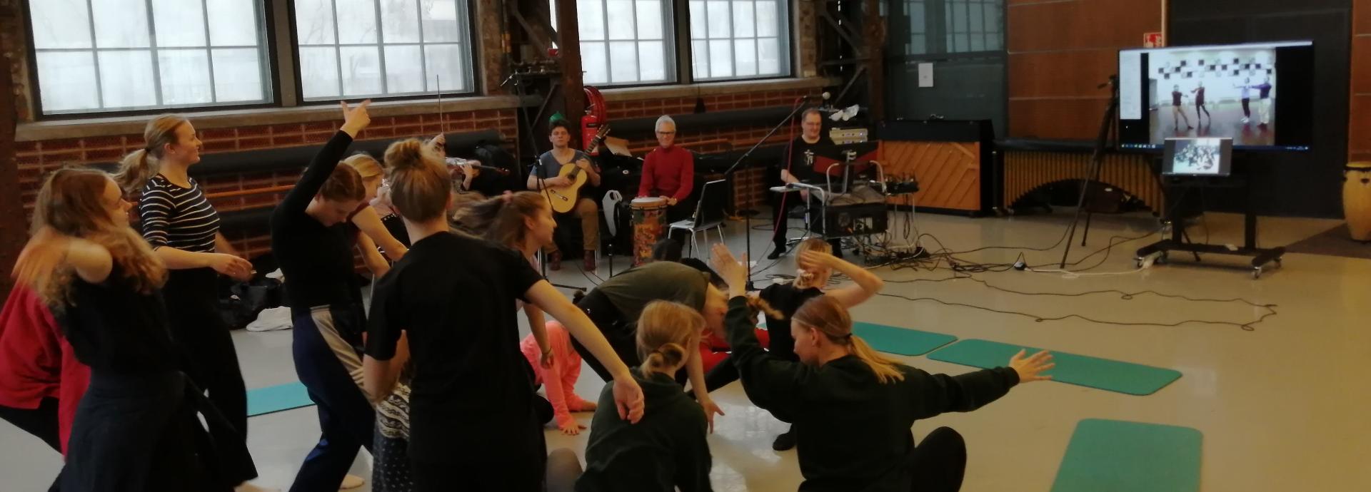 Specialist John Toenjes teaching TUAS students dance