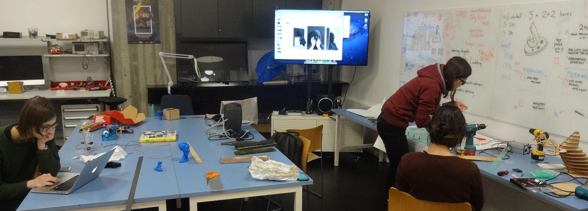 Engineering students working in a lab at Aalto University.