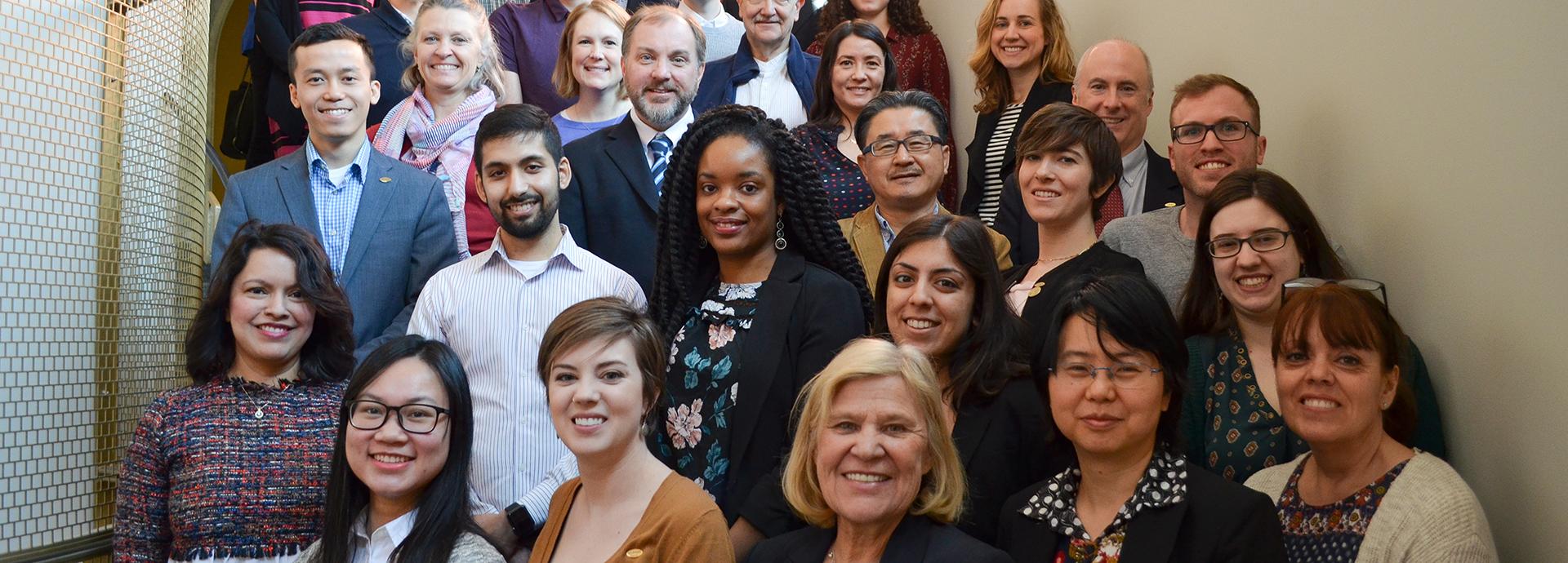 Group of U.S. Fulbright Finland grantees standing on stairs