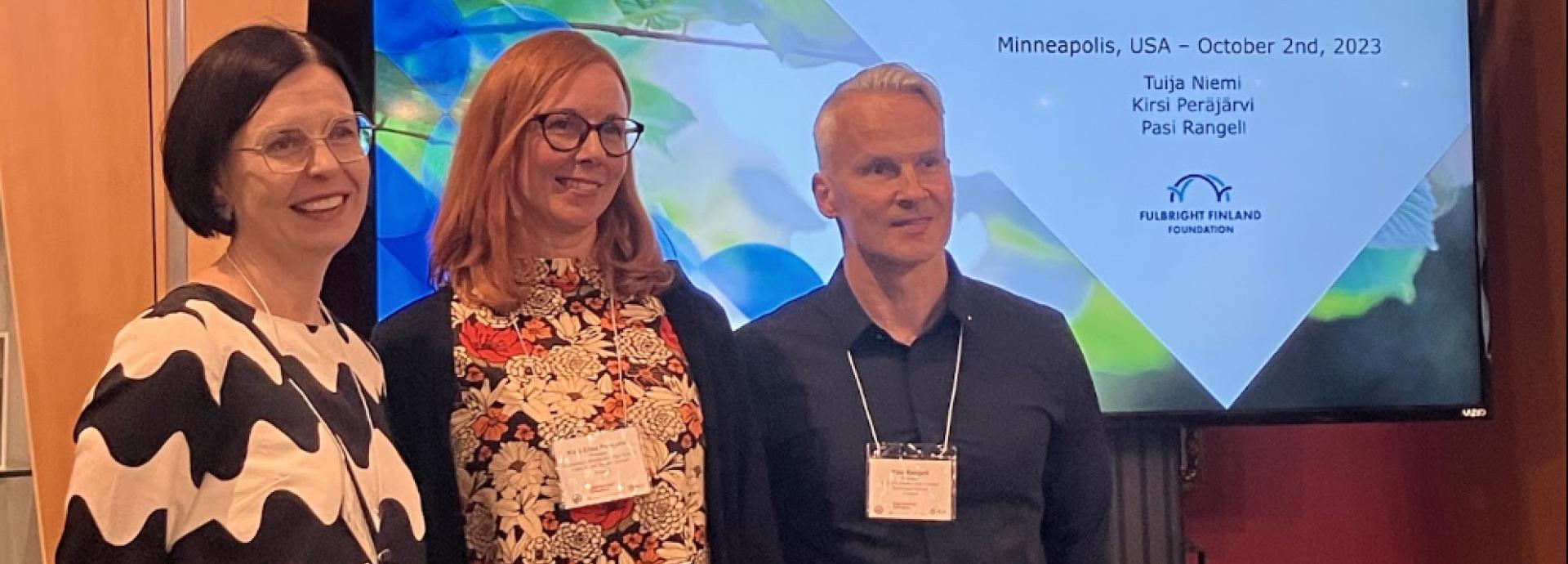 Tuija Niemi, Kirsi Peräjärvi, Rasi Rangell in front of a screen