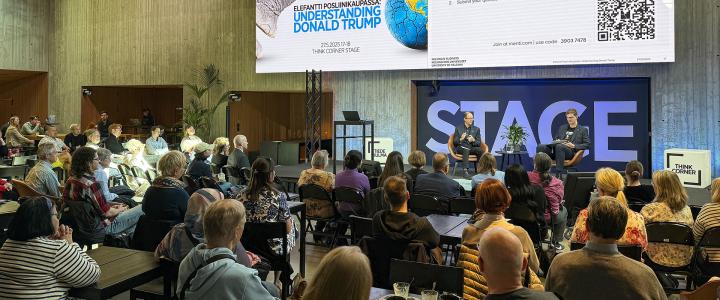 Josh Wilson being interviewed during his public talk at Think Corner Stage
