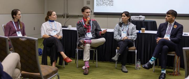 Fulbright Finland Foundation grantees Emilia Luiro (2nd from the left) and Vesa Orassalo (speaking) presenting with the Nordic Delegation at the Arctic Encounter Symposium.