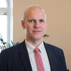 Man with blue eyes in a suit