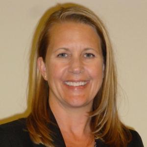 A close-up of a person smiling