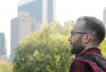 Undergraduate grantee Richard Söderlund with skyscrapers in the back